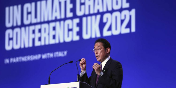 Japan's Prime Minister Fumio Kishida speaks during the UN Climate Change Conference COP26 in Glasgow, Scotland, Tuesday, Nov. 2, 2021. (Adrian Dennis/Pool Photo via AP)